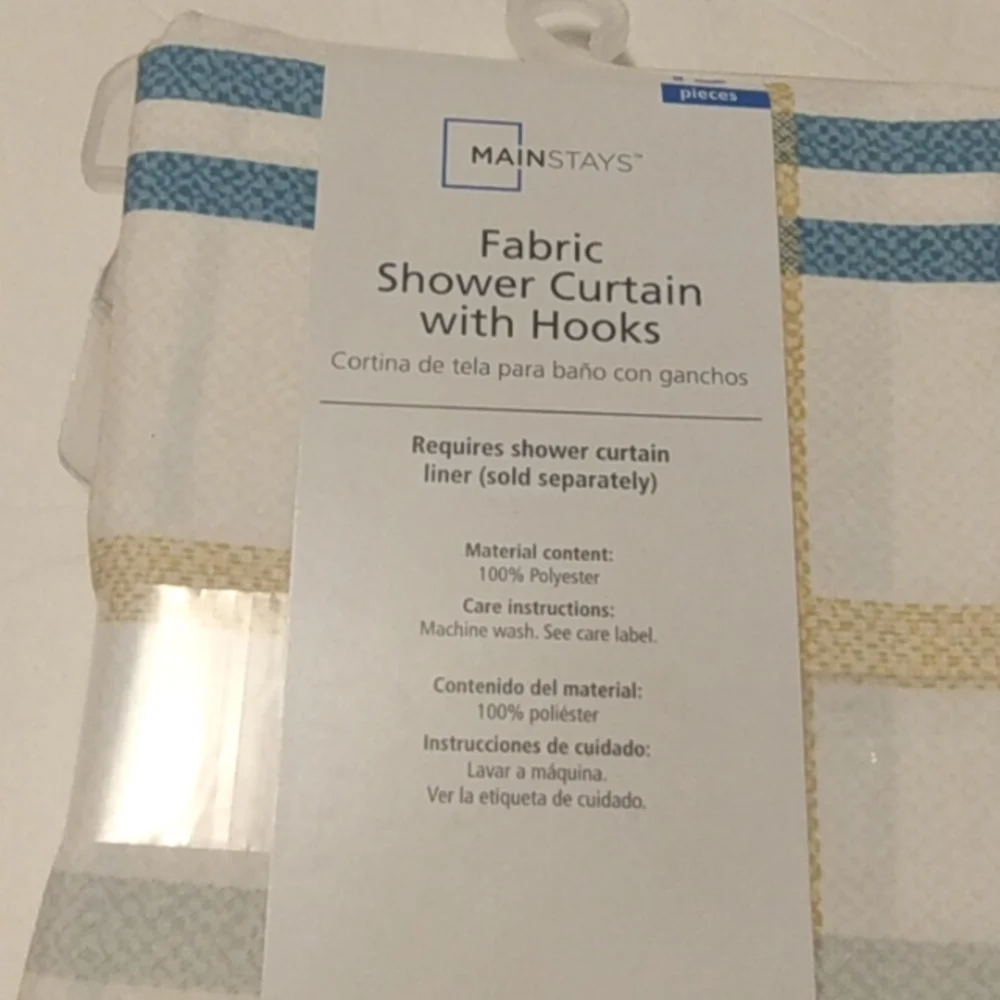 Mainstays 13 piece lightweight multi-colored printed fabric shower curtain.